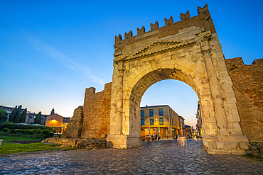 View of Arch of Augustus (Arco d'Augusto) at dusk, Rimini, Emilia-Romagna, Italy, Europe