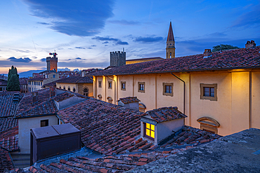 View of city skyline and rooftops from Palazzo della Fraternita dei Laici at dusk, Arezzo, Province of Arezzo, Tuscany, Italy, Europe