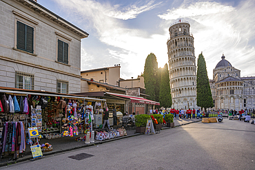 View of souvenir stalls and Leaning Tower of Pisa at sunset, UNESCO World Heritage Site, Pisa, Province of Pisa, Tuscany, Italy, Europe