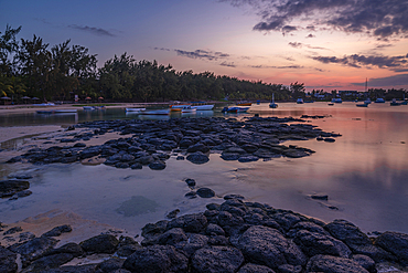 View of beach and Indian Ocean at dusk in Cap Malheureux, Mauritius, Indian Ocean, Africa