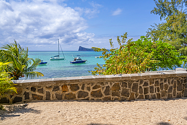 View of boats and turquoise Indian Ocean on sunny day in Cap Malheureux, Mauritius, Indian Ocean, Africa