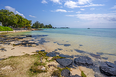 View of beach and turquoise Indian Ocean on sunny day in Cap Malheureux, Mauritius, Indian Ocean, Africa