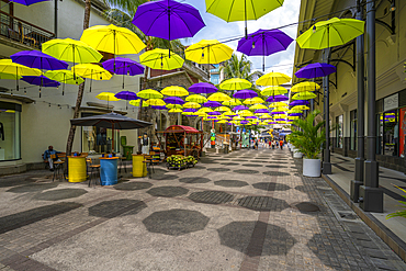 View of umbrellas and shops at Caudan Waterfront in Port Louis, Port Louis, Mauritius, Indian Ocean, Africa