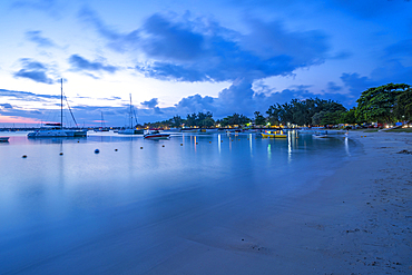 View of boats on the water in Grand Bay at dusk, Mauritius, Indian Ocean, Africa