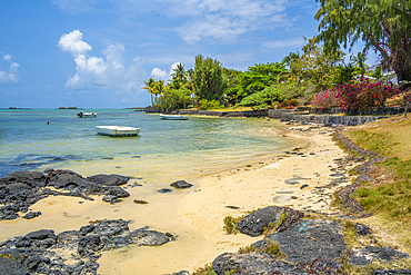 View of beach and turquoise Indian Ocean on sunny day in Cap Malheureux, Mauritius, Indian Ocean, Africa