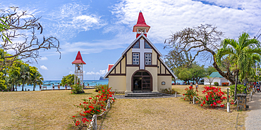 View of Notre-Dame Auxiliatrice de Cap Malheureux on sunny day in Cap Malheureux, Mauritius, Indian Ocean, Africa