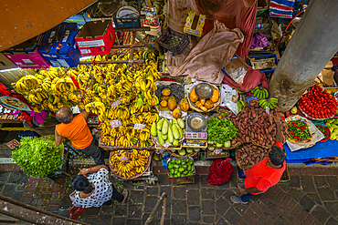 View of produce including vegetables and bananas on market stalls in Central Market in Port Louis, Port Louis, Mauritius, Indian Ocean, Africa