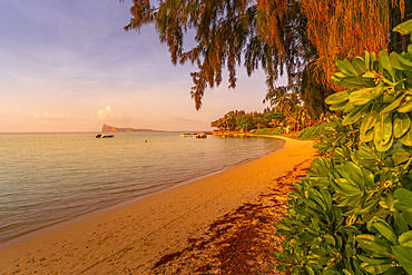 View of beach and Indian Ocean at sunset in Cap Malheureux, Mauritius, Indian Ocean, Africa