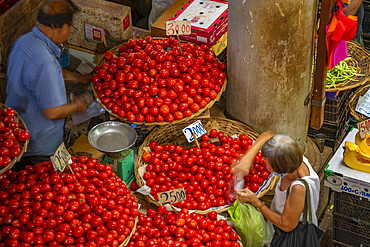 View of bright red tomatoes for sale in Central Market, Port Louis, Mauritius, Indian Ocean, Africa