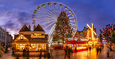 View of ferris wheel and Christmas Market on Old Market Square at dusk, Nottingham, Nottinghamshire, England, United Kingdom, Europe