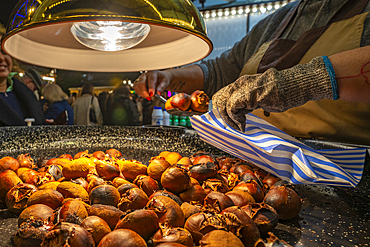 View of roast chestnut stall on Christmas Market, St. Georges Hall, Liverpool City Centre, Liverpool, Merseyside, England, United Kingdom, Europe