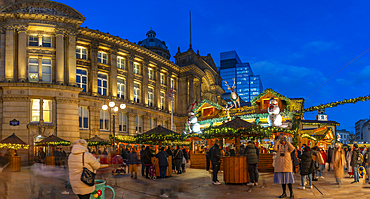 View of Christmas Market stalls in Victoria Square at dusk, Birmingham, West Midlands, England, United Kingdom, Europe