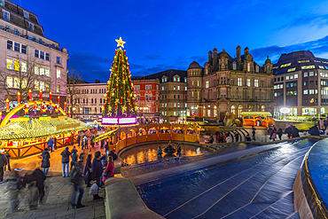 View of Christmas Market stalls in Victoria Square at dusk, Birmingham, West Midlands, England, United Kingdom, Europe