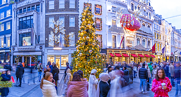 View of New Bond Street Christmas tree and shops at Christmas, Westminster, London, England, United Kingdom, Europe