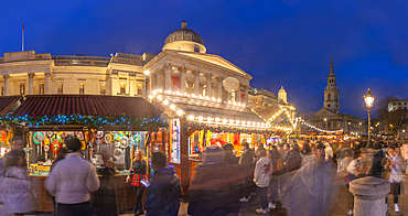 View of Christmas market and The National Gallery in Trafalgar Square at dusk, Westminster, London, England, United Kingdom, Europe