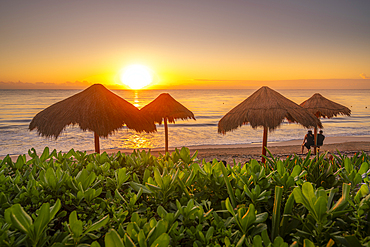 View of couple at sunrise and beach near Puerto Morelos, Caribbean Coast, Yucatan Peninsula, Mexico, North America