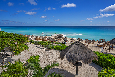 View of long white sandy beach at Playa Delfines, Hotel Zone, Cancun, Caribbean Coast, Yucatan Peninsula, Mexico, North America