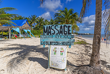 View of rustic massage sign on beach near Puerto Morelos, Caribbean Coast, Yucatan Peninsula, Mexico, North America