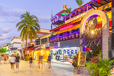 View of busy 5th Avenue at dusk, Playa del Carmen, Quintana Roo, Caribbean Coast, Yucatan Peninsula, Riviera Maya, Mexico, North America