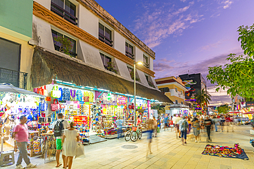 View of busy 5th Avenue at dusk, Playa del Carmen, Quintana Roo, Caribbean Coast, Yucatan Peninsula, Riviera Maya, Mexico, North America