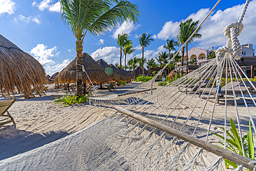 View of hammock on beach at Puerto Morelos, Caribbean Coast, Yucatan Peninsula, Riviera Maya, Mexico, North America