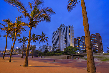 View of promenade and hotels from New Pier at dusk, Durban, KwaZulu-Natal Province, South Africa, Africa