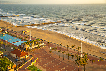 Elevated view of beaches, promenade and Indian Ocean at sunrise, Durban, KwaZulu-Natal Province, South Africa, Africa