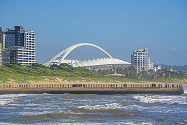 View of Moses Mabhida Stadium from pier in Indian Ocean, Durban, KwaZulu-Natal Province, South Africa, Africa