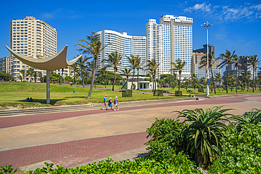 View of shrubs on promenade and hotels, Durban, KwaZulu-Natal Province, South Africa, Africa