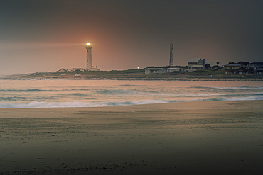 View of beach and Seal Point Lighthouse at sunrise, Cape St. Francis, Eastern Cape Province, South Africa, Africa