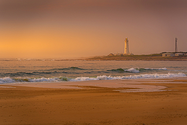 View of beach and Seal Point Lighthouse at sunrise, Cape St. Francis, Eastern Cape Province, South Africa, Africa