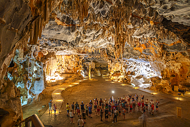 View of visitors viewing stalagmites and stalactites in the interior of Cango Caves, Oudtshoorn, Western Cape, South Africa, Africa