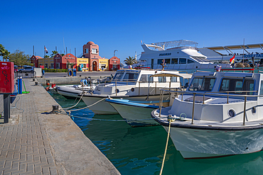 View of boats and colourful Harbour Office in Hurghada Marina, Hurghada, Red Sea Governorate, Egypt, North Africa, Africa