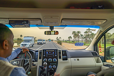 View of road from transit vehicle near Luxor, Thebes, Egypt, North Africa, Africa