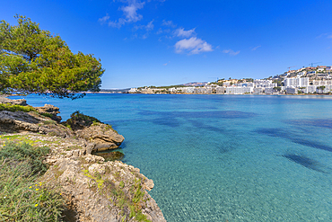 View of rocky shoreline by turquoise sea and Santa Ponsa, Majorca, Balearic Islands, Spain, Mediterranean, Europe