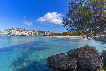 View of rocky shoreline by turquoise sea and Santa Ponsa, Majorca, Balearic Islands, Spain, Mediterranean, Europe