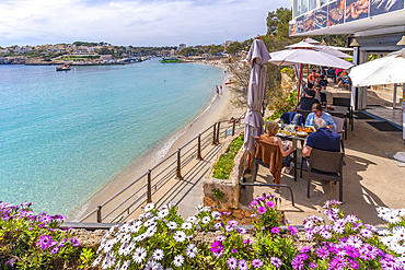 View of Platja de Portocristo beach from restaurant in Parc de Portocristo, Porto Cristo, Majorca, Balearic Islands, Spain, Mediterranean, Europe