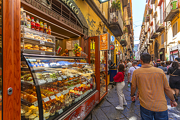 View of shops and architecture on bustling Via Benedetto Croce, Naples, Campania, Italy, Europe