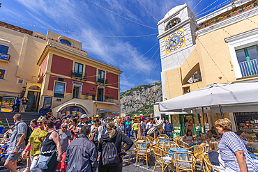 View of Clock Tower and cafes in Piazza Umberto I (La Piazzetta), Capri Town, Isle of Capri, Campania, Italy, Mediterranean, Europe