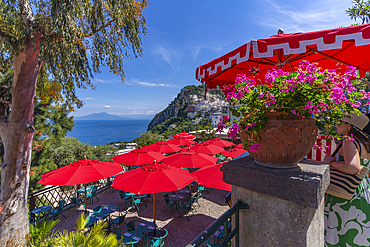 View of restaurant in Capri Town with Mount Vesuvius in background, Isle of Capri, Bay of Naples, Campania, Italy, Mediterranean, Europe