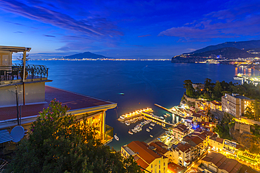 Panoramic view of Sorrento, Mount Vesuvius and Bay of Naples at night, Sorrento, Campania, Italy, Mediterranean, Europe