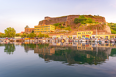 View of the New Fortress overlooking the Old Port Marina at sunset, Corfu, Ionian Sea, Greek Islands, Greece, Europe