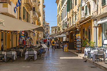 View of shops and cafes in narrow street, Corfu Town, Corfu, Ionian Sea, Greek Islands, Greece, Europe