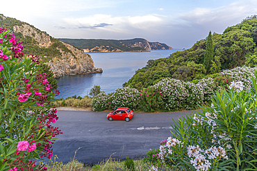 View of coastline from Monastery of Paleokastritsa at sunset, Palaiokastritsa, Corfu, Ionian Sea, Greek Islands, Greece, Europe