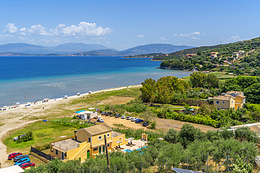 View of beach at Paralia Kalamaki and Albanian coast in background, Paralia Kalamaki, Corfu, Ionian Sea, Greek Islands, Greece, Europe