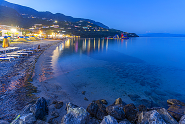 View of Ionian Sea and Ipsos Beach in Ipsos at dusk, Ipsos, Corfu, Ionian Sea, Greek Islands, Greece, Europe