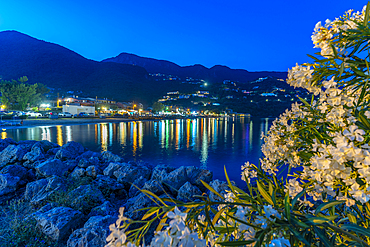 View of Ionian Sea and Ipsos Beach in Ipsos at dusk, Ipsos, Corfu, Ionian Sea, Greek Islands, Greece, Europe