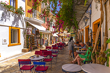 View of cafes and restaurants in Gaios Plaza de l'Ascension in Gaios Town, Paxos, Ionian Sea, Greek Islands, Greece, Europe