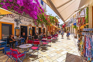 View of cafes and restaurants in Gaios Plaza de l'Ascension in Gaios Town, Paxos, Ionian Sea, Greek Islands, Greece, Europe