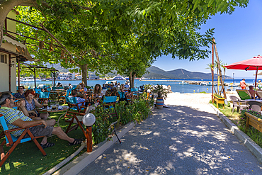 View of restaurant and harbour in Thassos Town, Thassos, Aegean Sea, Greek Islands, Greece, Europe